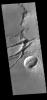 The linear depressions in this image from NASA's 2001 Mars Odyssey spacecraft are graben. Graben are formed from tectonic activity with large blocks of material moving downward between paired faults.