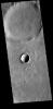 This image captured by NASA's 2001 Mars Odyssey spacecraft shows two craters in Terra Cimmeria just north of Kepler Crater. The small crater in the middle of the image is a relatively new crater.