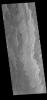 This image captured by NASA's 2001 Mars Odyssey spacecraft shows a portion of Daedalia Planum, an extensive volcanic plain comprised of flows from Arsia Mons.