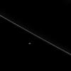 As NASA's Cassini hurtled toward its fatal encounter with Saturn, the spacecraft turned to catch this final look at Saturn's moon Pandora next to the thin line of the F ring.