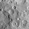 NASA's Dawn spacecraft took this image of Hakumyi Crater on Ceres, visible left of center. Evidence for organics was also found at the 4-mile (6.5 kilometer) wide fresh crater on the southern rim of Hakumyi.