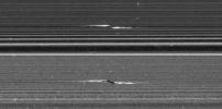 NASA's Cassini spacecraft captured these remarkable views of a propeller feature in Saturn's A ring on Feb. 21, 2017. These are the sharpest images taken of a propeller (nickedname 'Santos-Dumond') so far.