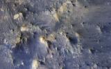 This color composite from NASA's Mars Reconnaissance Orbiter covers a portion of the northern central peak of an unnamed, 20-kilometer crater that contains abundant fragmental bedrock called breccia.
