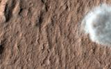 This image captured by NASA's Mars Reconnaissance Orbiter shows a portion of one of many dust devils on Mars.