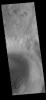 This image captured by NASA's 2001 Mars Odyssey spacecraft shows a portion of a sand sheet with surface dune forms on the floor of an unnamed crater in Noachis Terra.