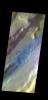 The THEMIS camera contains 5 filters. The data from different filters can be combined in multiple ways to create a false color image. This image from NASA's 2001 Mars Odyssey spacecraft shows a section of Tempe Fossae located in Tempe Terra.