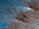 This image is an oblique view from NASA's Mars Reconnaissance Orbiter of the sloping edge of the stack of icy layers over the South Pole that has some interesting morphologies.