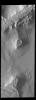 This image from NASA's 2001 Mars Odyssey spacecraft shows late afternoon shadows. This image is located in Cavi Angusti.