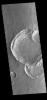 This image from NASA's 2001 Mars Odyssey spacecraft is of a group of craters in Solis Planum. Because three of the craters are overlapping it is possible to determine the order in which those three were created.