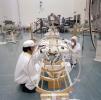This archival photo shows engineers working with the deployed magnetometer boom of one of NASA's Voyager spacecraft in Florida on June 17, 1977.