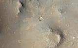 This image from NASA's Mars Reconnaissance Orbiter shows one of millions of small craters and their ejecta material that dot the Elysium Planitia region of Mars.