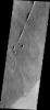 This image captured by NASA's 2001 Mars Odyssey spacecraft shows a collapse feature on the southeastern flank of Mars' Ascraeus Mons.