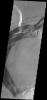 This image captured by NASA's 2001 Mars Odyssey spacecraft shows part of the complex caldera at the summit of Ascraeus Mons on Mars.