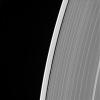 This image of Saturn's outer A ring features the small moon Daphnis and the waves it raises in the edges of the Keeler Gap. The image was taken by NASA's Cassini spacecraft on Sept. 13, 2017. It is among the last images Cassini sent back to Earth.