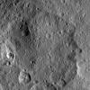This image taken by NASA's Dawn spacecraft shows Duginavi Crater, a large crater on Ceres. Duginavi hosts the small Oxo Crater, recognizable by its bright rim and ejecta.