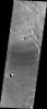 This image captured by NASA's 2001 Mars Odyssey spacecraft shows part of the dune field near Meroe Patera. Winds are blowing the dunes across a rough surface of regional volcanic lava flows.