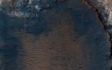 This image from NASA's Mars Reconnaissance Orbiter (MRO) captures details of an approximately 1-kilometer inverted crater west of Mawrth Vallis. Prolonged erosion removed less resistant rocks leaving behind other rocks.