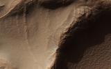 This image from NASA's Mars Reconnaissance Orbiter (MRO) targets a portion of a group of honeycomb-textured landforms in northwestern Hellas Planitia, part of one of the largest and most ancient impact basins on Mars.