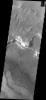 Melas Chasma is part of the largest canyon system on Mars, Valles Marineris. This image of the southern section of the canyon captured by NASA's 2001 Mars Odyssey spacecraft shows a large region of sand dunes.