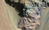 An enhanced-color image from NASA's Mars Reconnaissance Orbiter (MRO) reveals bedrock that is several kilometers below the top of the giant Valles Marineris canyons.