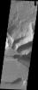 Tithonium Chasma has numerous large landslide deposits. At the bottom of this image captured by NASA's 2001 Mars Odyssey spacecraft is the high plateau between Tithonium Chasma and Ius Chasma.