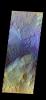 This is a false color image of the dune field in the Arabia Terra crater captured by NASA's 2001 Mars Odyssey spacecraft. In this combination of bands, sand appears as a blue to dark blue color.