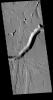 Olympica Fossae is a complex channel located on the volcanic plains between Alba Mons and Olympus Mons. The sinuosity of the large channel in the middle of this image from NASA's 2001 Mars Odyssey indicates that this is a channel created by liquid flow.