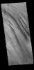 This image captured by NASA's 2001 Mars Odyssey spacecraft shows a small portion of Lobo Vallis near where it recombines with Kasei Valles and empties into Chryse Planitia.