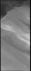 This image captured by NASA's 2001 Mars Odyssey spacecraft shows the margin between the polar cap and the surrounding plains. There are dunes on the plains at the top of the image.