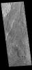 This image captured by NASA's 2001 Mars Odyssey spacecraft shows a small portion of the lava flows that comprise Daedalia Planum. The flows originated at Arsia Mons, the youngest of the three Tharsis volcanoes.