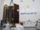 Technicians inspect NASA's twin GRACE Follow-On satellites and their multi-satellite dispenser at the SpaceX facility at Vandenberg Air Force Base in California.