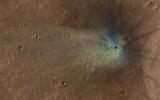 NASA's Mars Reconnaissance Orbiter continually finds new impact sites on Mars. This one occurred within the dense secondary crater field of Corinto Crater. The new crater and its ejecta have distinctive color patterns.