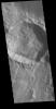This image from NASA's Mars Odyssey shows a smaller crater containing a multitude of dark slope streaks on the rim of Chia Crater. These features are assumed to represent down slope movements of material.
