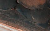 This image from NASA's Mars Reconnaissance Orbiter shows many new ice blocks compared to earlier images in 2006. One of the most actively changing areas on Mars are the steep edges of the North Polar layered deposits.