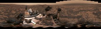NASA's Curiosity rover surveyed its surroundings on Aug. 9, 2018, showing its current location on Mars' Vera Rubin Ridge. The panorama includes skies darkened by a fading global dust storm and a rare view of the rover itself.