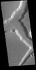 This image from NASA's Mars Odyssey shows right angle intersections from some of the graben that form Sacra Fossae. The fossae are located on the margin of Lunae Planum near the beginning of Kasei Valles.