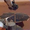 This image shows one of NASA InSight's 7-foot (2.2 meter) wide solar panels as captured by the lander's Instrument Deployment Camera, which is fixed to the elbow of its robotic arm.