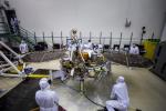 Engineers at Lockheed Martin Space, Denver, Colorado, test the solar arrays on NASA's InSight lander several months before launch.