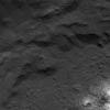 This image of the base of Occator Crater's eastern wall next to the Vinalia Faculae on Ceres was obtained by NASA's Dawn spacecraft on July 23, 2018 from an altitude of about 84 miles (135 kilometers).