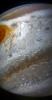 A south tropical disturbance that has just passed Jupiter's iconic Great Red Spot is captured in this color-enhanced image from NASA's Juno spacecraft.