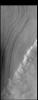 This image from NASA's Mars Odyssey shows a line of clouds located over the ice of the south polar cap.