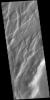 This image from NASA's Mars Odyssey shows Claritas Fossae, a graben filled highland, located between the lava plains of Daedalia Planum and Solis Planum.
