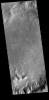 This image from NASA's Mars Odyssey shows part of an unnamed crater in Aonia Terra. The rim of this crater contains many deep gullies.