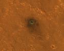NASA's InSight spacecraft and its recently deployed Wind and Thermal Shield were imaged on Feb. 4, 2019, by the HiRISE camera aboard NASA's Mars Reconnaissance Orbiter.