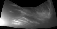 NASA's Curiosity Mars rover imaged these drifting clouds on May 17, 2019, the 2,410th Martian day, or sol, of the mission, using its Navigation Cameras (Navcams).