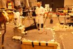 Engineers in a Mars-like test area at NASA's Jet Propulsion Laboratory try possible strategies to aid the Heat Flow and Physical Properties Package (HP3) on NASA's InSight lander, using engineering models of the lander, robotic arm and instrument.