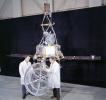 This image shows two engineers standing with Mariner 1 on May 2, 1962, at JPL's Spacecraft Assembly Facility.