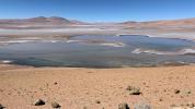 Filled with briny lakes, the Quisquiro salt flat in South America's Altiplano represents the kind of landscape that scientists think may have existed in Gale Crater, which NASA's Curiosity rover is exploring.