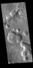 This image from NASA's Mars Odyssey shows pits and channels located along the margin between Arabia Terra and Acidalia Planitia.