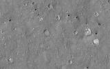 This image acquired on September 26, 2023 by NASA's Mars Reconnaissance Orbiter shows terrain north of Elysium Planitia and Athabasca Valles.
